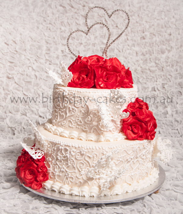 roses and butterflies wedding cake